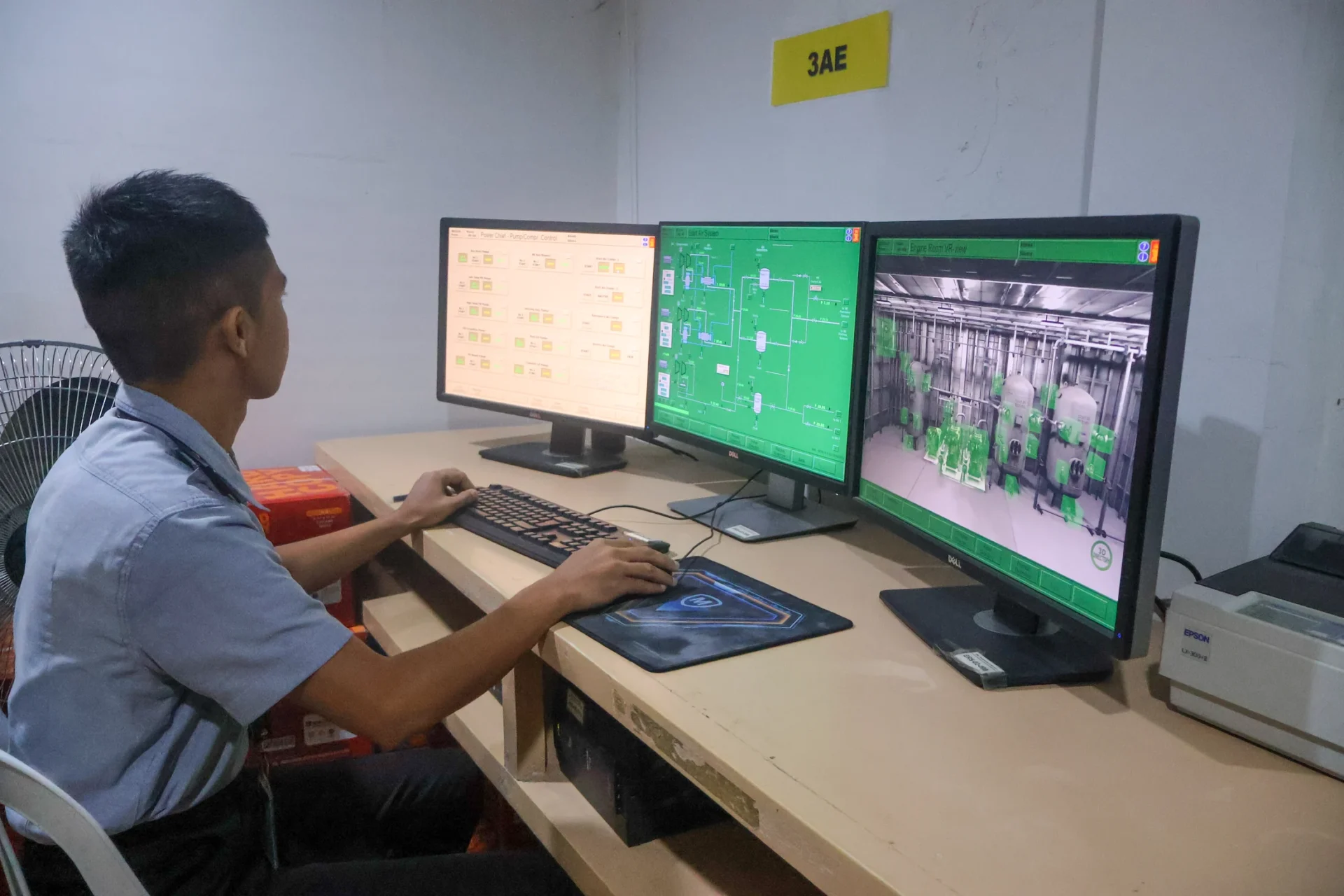 Student operating the VMA marine engineering simulator